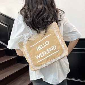 Japanese style straw tote bag featuring Hello Weekend canvas patch and lace trim