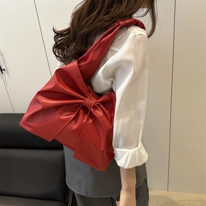 Fashionable red bow-shaped tote bag in high-quality PU leather for summer 2025