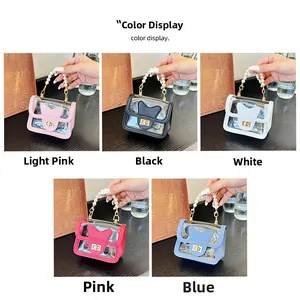 Detail showing five colors of transparent mini bags with pearl handles and bow decor