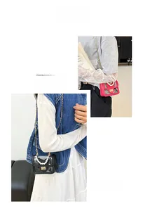 Close-up of pink and black mini crossbody bags with pearl handles and gold chains