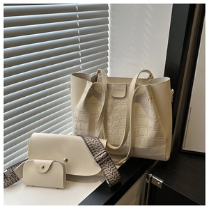 Three-piece beige tote bag set with crocodile texture and ethnic style woven shoulder strap
