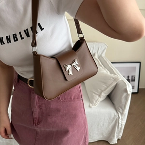 Brown PU leather shoulder bag featuring a silver metal butterfly accent for women