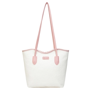 Minimalist white tote bag with pink handles and embossed cartoon motifs for daily commute