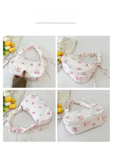 Detailed views of floral pleated handbag with rose patterns and side drawstring bows