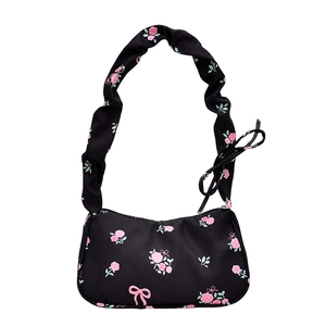 Floral black baguette bag with pink rose patterns and stylish scrunchie shoulder strap