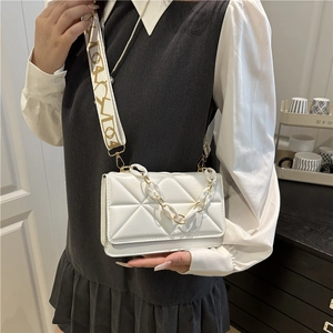 White quilted crossbody bag with stylish chain handle and wide graphic shoulder strap