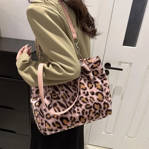Chic pink leopard print plush tote bag with silver chain and leather shoulder strap