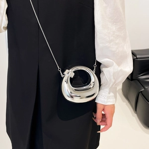 Minimalist silver mirror metal mini bag with sleek snake chain for chic fashion styling