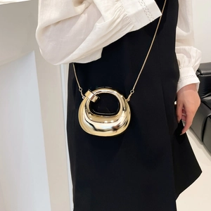 Elegant gold geometric semi-circle crossbody bag with minimalist metal chain strap