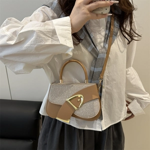 Stylish khaki leather crossbody bag with silver glitter flap and metal D-buckle