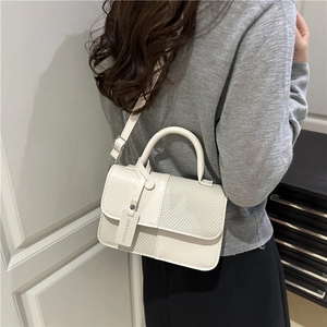 Retro color-block crossbody bag in beige leather with woven texture and top handle