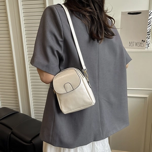 Cream mini crossbody phone bag with gold hardware and elegant rectangular flap design