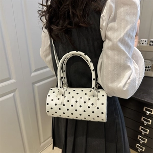 Sac à main boston cylindrique à pois pour femme porté en bandoulière élégante