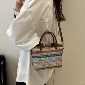 Colorful striped straw bucket bag with brown leather strap for summer fashion