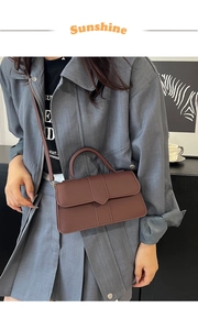 Chic dark brown vintage flap crossbody bag styled with a grey-blue autumn outfit