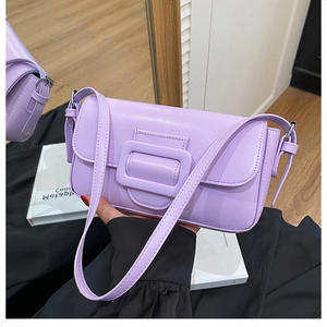 Detail of lavender PU leather shoulder bag with matching square buckle and strap