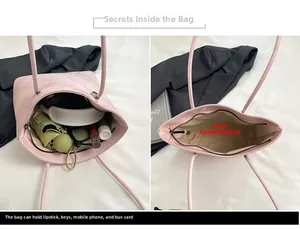 Vue détaillée de l'intérieur du cabas rose imprimé montrant sa grande capacité de rangement