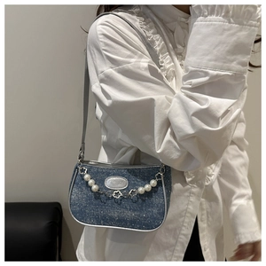 Blue sequined denim shoulder bag with pearl floral chain and fashion logo detail