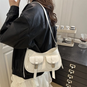 Minimalist white patent leather underarm bag with double buckle front pockets and silver hardware