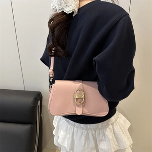 Pink retro baguette shoulder bag with gold oval buckle and adjustable strap