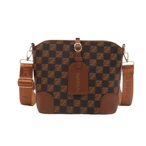 Brown checkerboard bucket bag with wide Fashion strap and gold metal hardware detailing