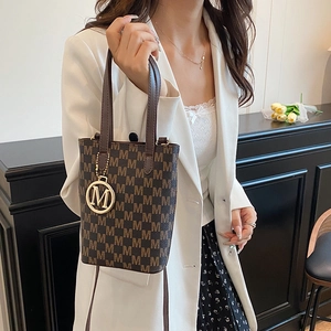 Large capacity tote bag with dark brown M-letter print and gold metal charm