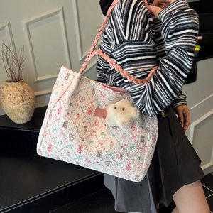 Cute cartoon bear canvas tote bag with pink braided handles and plush cloud pendant