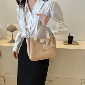 Khaki PU leather tote bag with rabbit charm and adjustable strap for women in office
