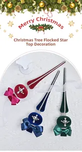 Detail of flocked Christmas tree star toppers with rhinestones and ribbon bows