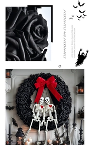 Detail of gothic Halloween wreath with black roses, skull accents and red ribbon bow
