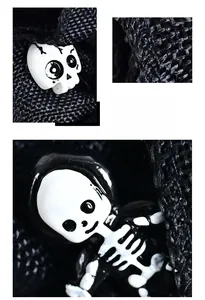 Detail of Halloween skeleton decoration with rustic black burlap fabric texture