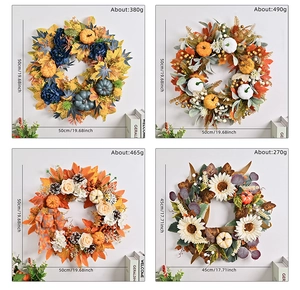 Comparison of fall wreaths in 45cm and 50cm sizes featuring pumpkins and maple leaves