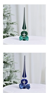 Detail of velvet Christmas tree toppers with sparkling rhinestones and satin bows