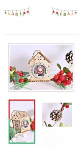 Detail of Christmas wooden house ornament with pine cones, red berries and painted Santa Claus