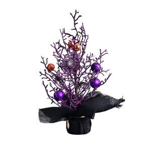 Halloween black tree decor with purple glitter branches and festive orange ornaments