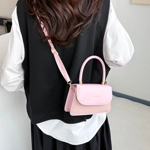 Elegant pink patchwork crossbody bag with woven texture and gold hardware for women
