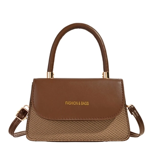 Elegant brown patchwork crossbody bag with woven texture and top handle on white background