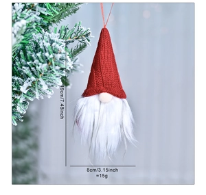Detailed size view of a 19cm red Christmas gnome plush ornament hanging on a tree branch