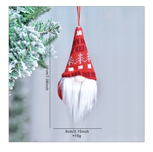 Detail of red knitted Christmas gnome ornament with white beard and size dimensions