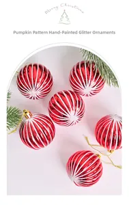 Set of 6 red pumpkin-shaped Christmas ornaments with white glitter stripes and gold caps