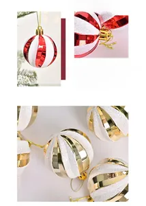 Detailed view of red and gold striped Christmas baubles with matte and metallic finishes