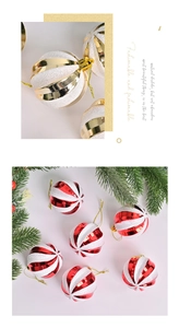 Detail of red and gold spiral Christmas ball ornaments with glitter coating finish