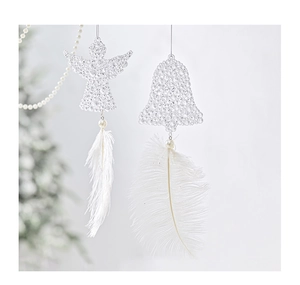 Detail of white Christmas angel and bell ornaments with pearls and soft feathers
