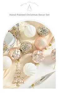 Detail of hand-painted Christmas ornaments with glitter patterns on silk background