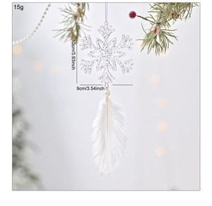Christmas tree decoration featuring white snowflake and soft feather with size dimensions