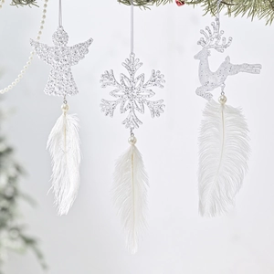 Christmas tree ornaments with feathers pearls and glittery angel snowflake shapes