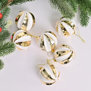 Set of 6 white and gold glitter spiral Christmas ball ornaments with festive pine decor