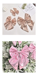 Close-up of rose gold and pink sequined Christmas tree bows for festive holiday decoration