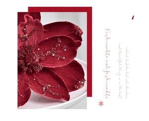Macro detail of deep red flocked magnolia petals with sparkling bead and sequin accents