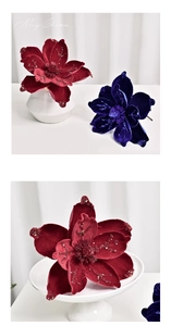 Detail of velvet magnolia flowers with glitter petals for Christmas decor